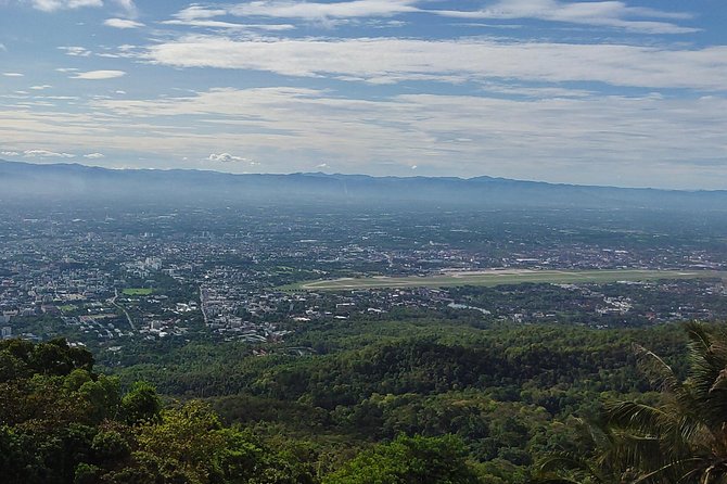 4 highlights: Sticky Waterfall/Elephants/local market /Wat Banden - Sticky Waterfall: Walking, Splashes, and Water Massage Fun