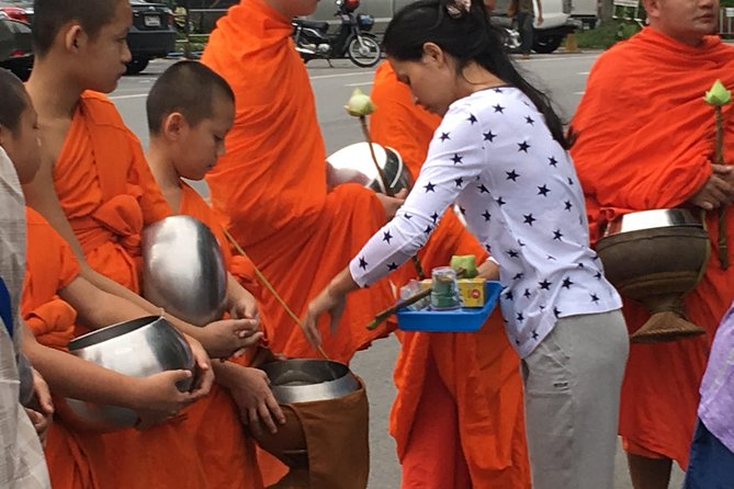 4 highlights: Sticky Waterfall/Elephants/local market /Wat Banden - Monk Alms First, Then Temples With Real Context