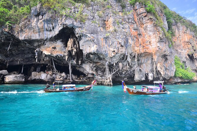 6 Hours Private Tour Around Phi Phi Islands From Phi Phi - Wang Long Bay: turquoise water and fish activity