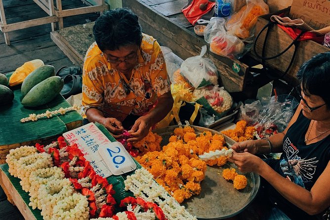 A night at the market - Orchids, marigolds, and the local rhythm before the tuk tuk hop