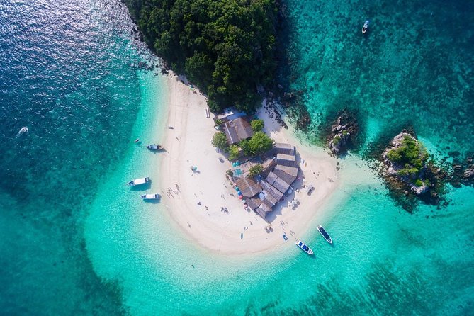 All-in Phi Phi, Maiton, MayaBay, Khai, Bamboo islands Tour - Hotel pickup, the pier briefing, and how the speedboat actually feels