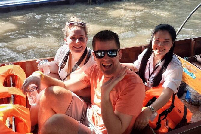 Amphawa Boat Ride & Railway Market: Multi-Lang Private Tour - Stop 3, Wat Bang Kung: banyan roots and a temple that looks different