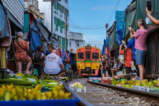 Amphawa Floating Market & Maeklong Railway Train Market Tour - Price and logistics: pickup areas, timing, and how the day flows