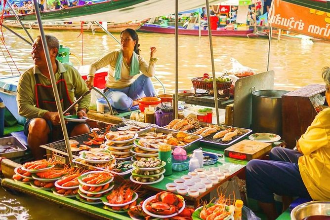Amphawa Floating Market Tour with Maeklong Railway Market (SHA Plus) - The Maeklong Railway Market train moment you came for