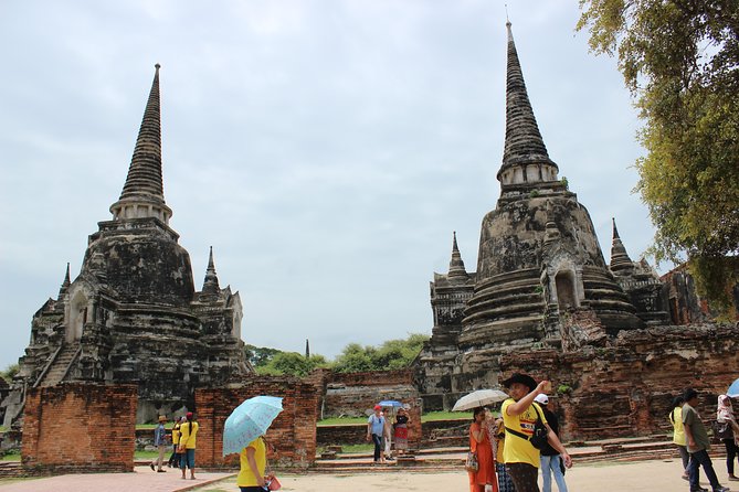 Ancient City Ayutthaya Private Guided Day Tour - Wat Mahathat: The Buddha Head in Tree Roots Moment