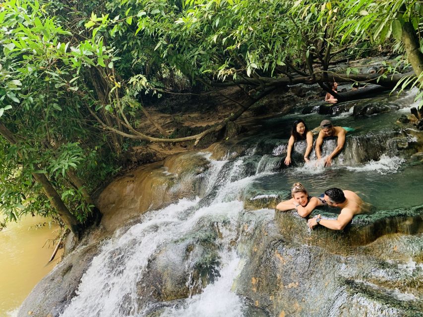 Ao Nang: Hot Spring, Emerald Pool & Tiger Cave Temple Tour - Hot Spring Waterfall: Warm Water Therapy Before the Stairs
