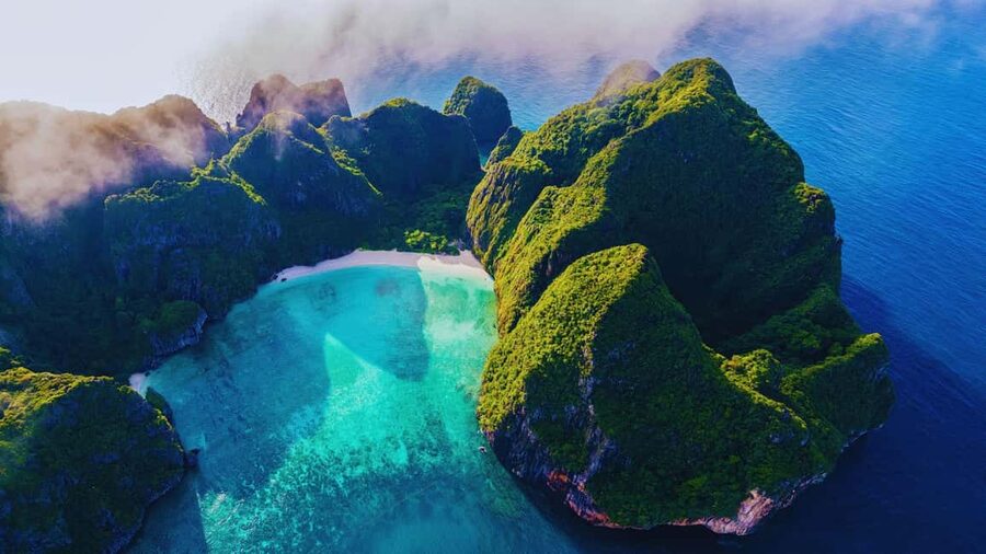Ao Nang: Phi Phi Islands Speedboat or Catamaran Tour One day - Viking Cave: rock views plus short swim/snorkel time