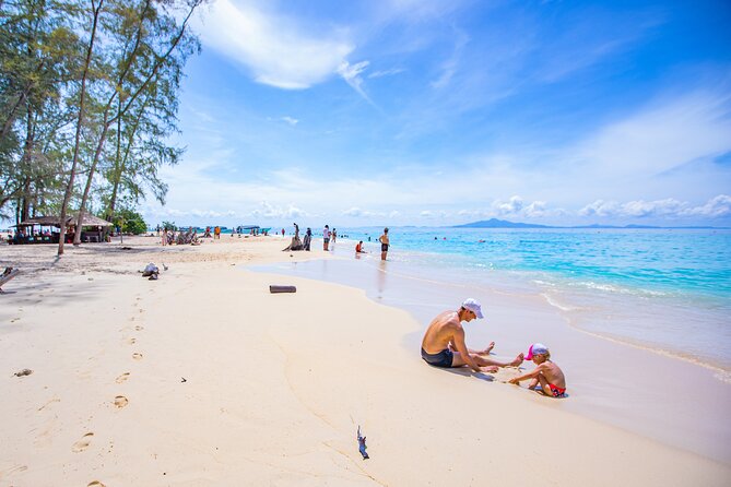 Bamboo Island and Phi Phi Island Full Day Tour From Phuket - Loh Samah Bay and Pileh Bay: beach color plus the Emerald Lagoon look