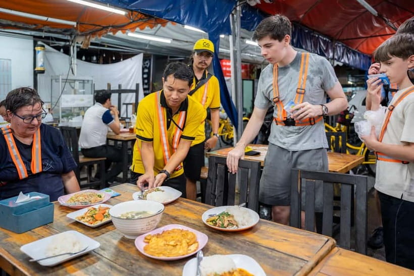 Bangkok by Night Cycling Tour with Street-food Meal - Chao Phraya by ferry: Memorial Bridge and the glow you came for