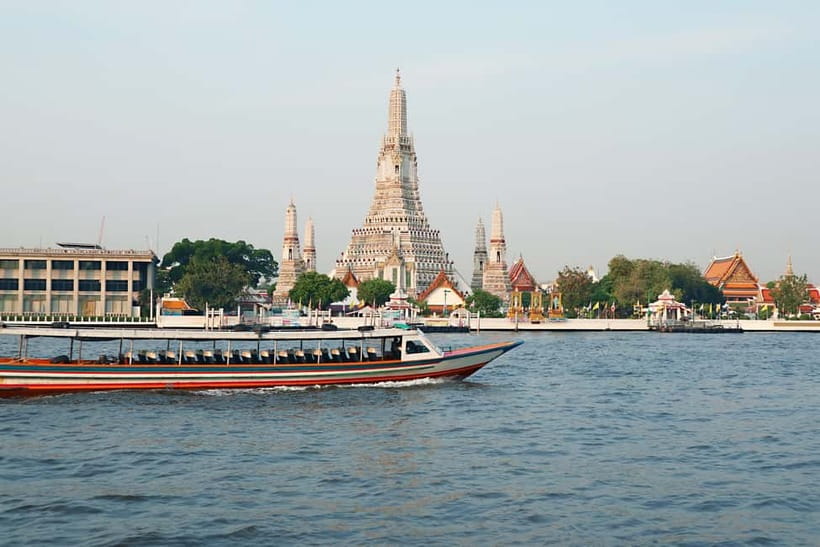 Bangkok: Canal Tour, River Local Life & Wat Arun Guide Visit - Meeting at Kin & Koff, then stepping onto the teak boat