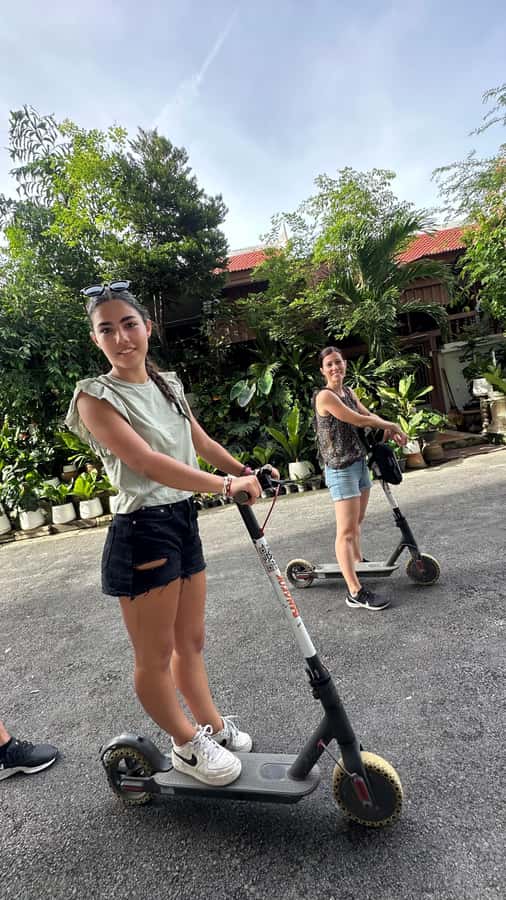 Bangkok: City Highlights Electric Scooter Tour - The feel of Bangkok by electric scooter: quick, practical, fun