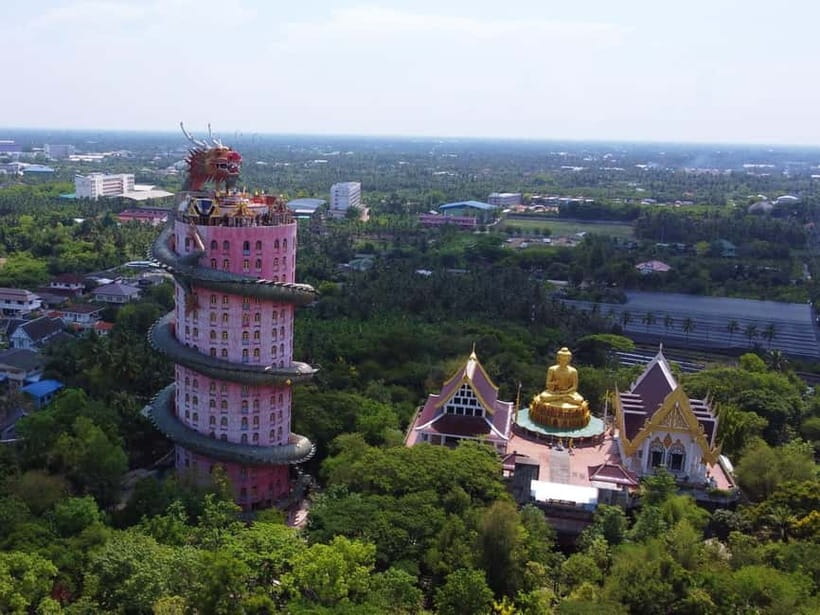 Bangkok: Famous Markets and Dragon Temple Guided Day Tour - Damnoen Saduak Floating Market canals, boats, fruit, and photos