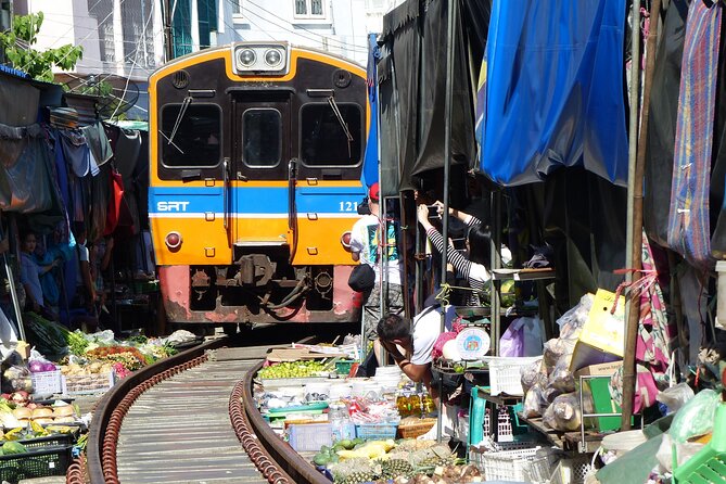 Bangkok: Floating Market and Train Tour with Guide in Spanish and English - What you get for $25.75: value that’s real, plus a few budget extras