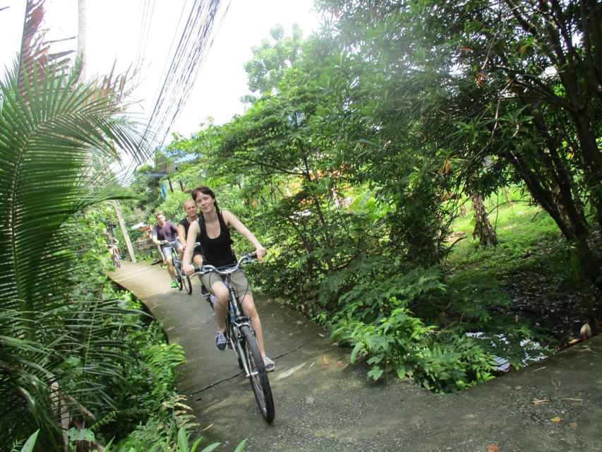 Bangkok Full-Day Bike Tour with Boat Transfer and Lunch - Under the Highway Communities, Tropical Fruit, and Real Daily Life