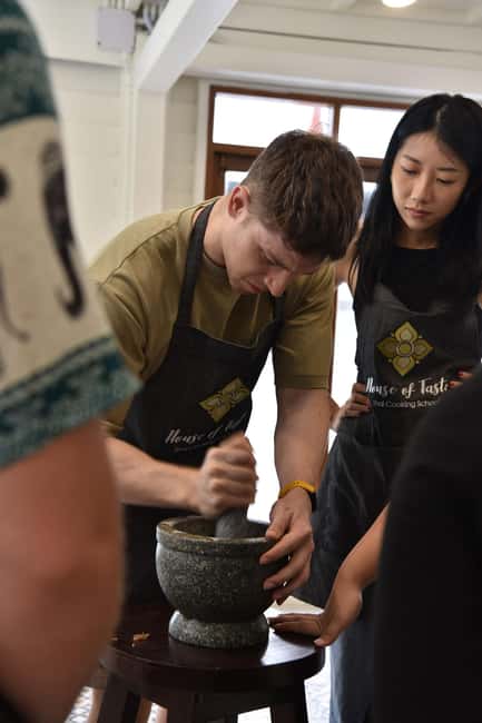 Bangkok: Hands-on Thai Cooking Class & Market Tour in Sathon - Cooking Four Thai Dishes, Then Eating While Hot
