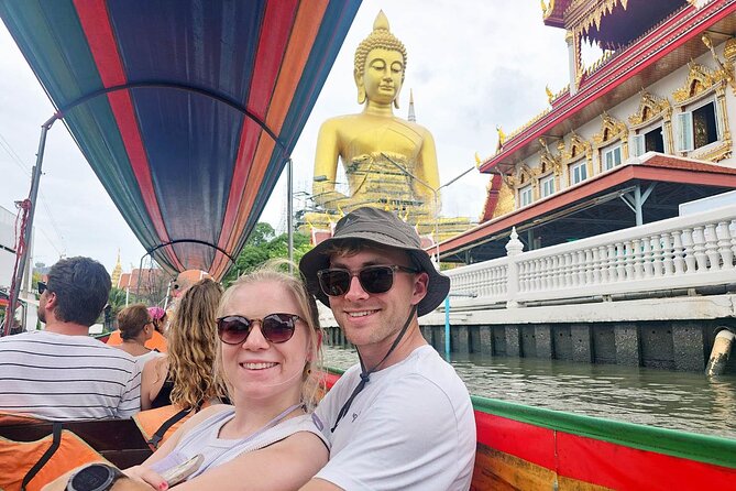Bangkok Long Boat Canal a Big Buddha and Culture Markets Tour - Wat Paknam Phasi Charoen and the Big Buddha moment from the water