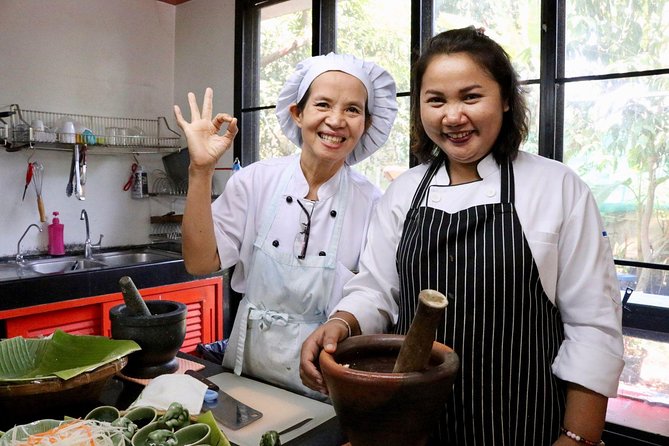 Bangkok Market Tour & Thai Cooking Class with Boat Ride with Aoy - Stop 2 bonus feel: Aoy’s herb garden influence
