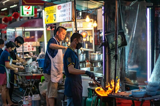 Bangkok Night Tour: Wat Arun, Wat Pho, Chinatown & Tuk Tuk Ride - Chinatown by ferry and tuk-tuk: Yaowarat Road is your final payoff