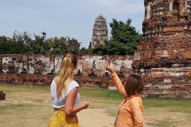 Bangkok: Private Ayutthaya and Bang Pa-In Summer Palace Tour - Wat Yai Chaya Mongkol near the river: calmer ruins and easy photo moments