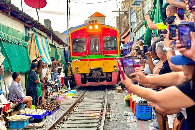 Bangkok: Railway and Floating Market Tour + Dragon Temple - Maeklong Railway Market, where stalls move when the train comes