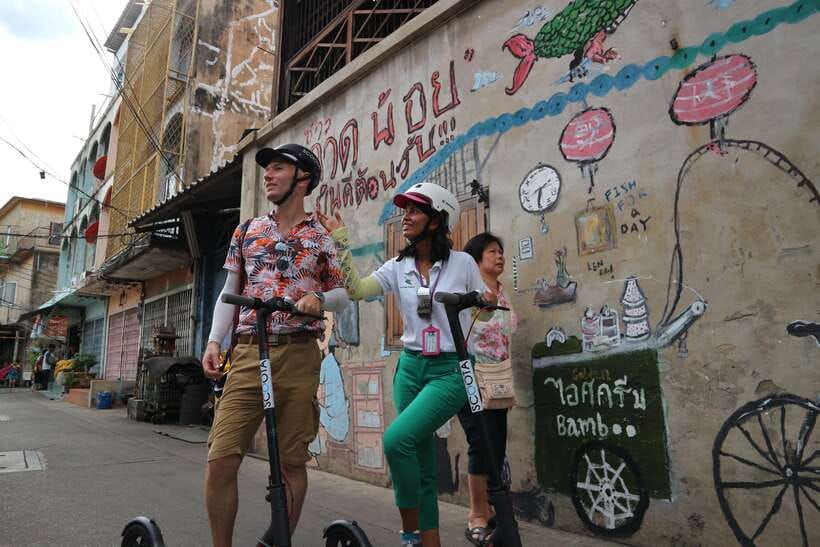 Bangkok: Riverside E-Scooter Adventure with StreetFood Snack - Wat Prayurawongsawat Worawihan and Turtle Feeding: A Sweet, Responsible Moment