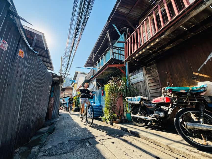 Bangkok: Temples, Canals & Local Life Bike Tour - Why Thonburi by Bike Feels More Like Daily Life Than Sightseeing