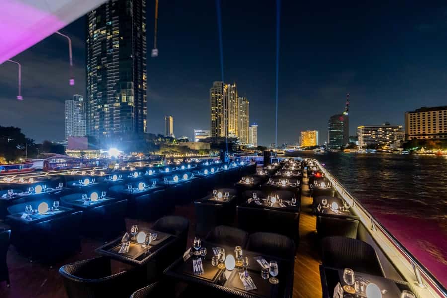 Bangkok: The Opulence Buffet Dinner Cruise with Live Band - The sights from the water: Wat Arun, Grand Palace, and the bridge stretch