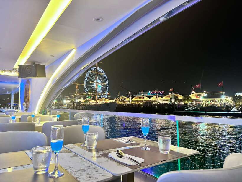 Bangkok: The Planet Chao Phraya River Dinner Cruise - Fruit cocktail, live music, and Thai classical dance during the sail