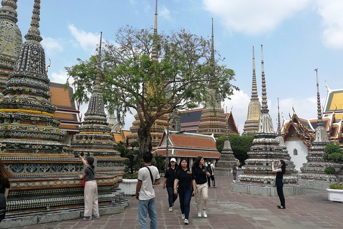 Bangkok Tour: Highlights & Hidden Gems & Long Tail Boat - Wat Arun on the west bank: a landmark you can clock quickly