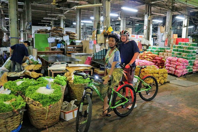 Bike Bangkok at Night with Thai Dinner - Wat Arun at night and the ferry skyline moment