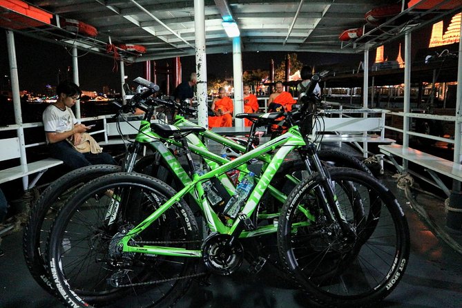 Bike Bangkok at Night with Thai Dinner - Chinatown cycling: neon alleys, street food atmosphere, and constant motion