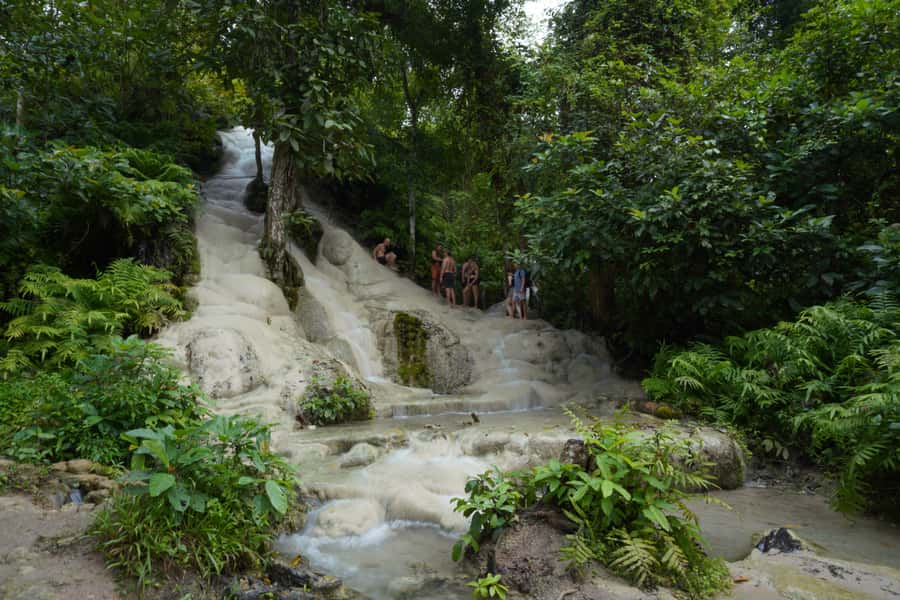 Chiang Mai: Bua Thong Sticky Waterfall & Huge Cave & Buffet - Hotel pickup, van ride, and how the day actually moves