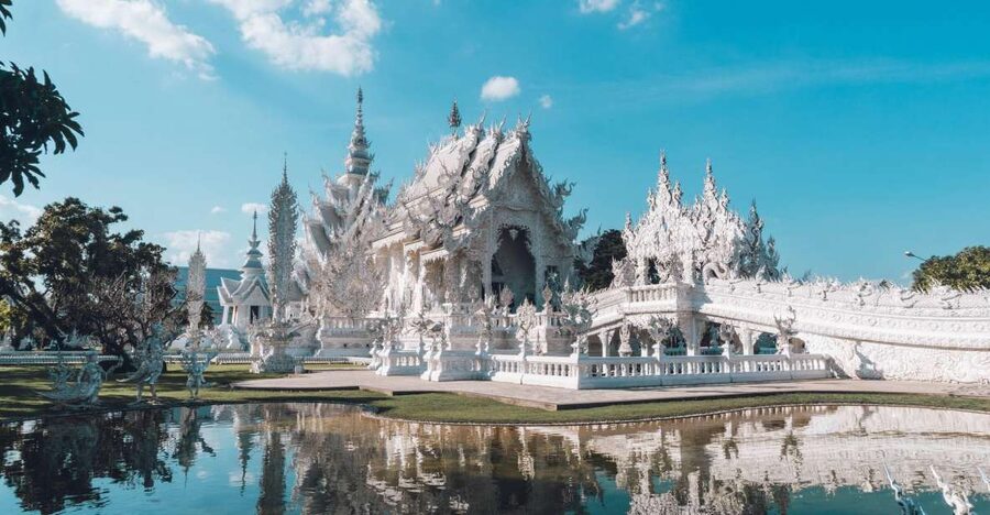 Chiang Mai: Chiang Rai Temples & Black House Discovery Tour - Wat Rong Khun, the White Temple: Glasswork, Pond Reflections, and Rules