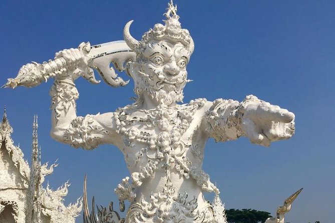 Chiang Mai-Chiang Rai:White-Black-Blue Temple-Golden Triangle-Keren-Boat Trip - Karen Long Neck Hill Tribe village visit: meaningful intro, but set expectations