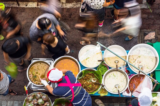 Chiang Mai Michelin Food Walking Tour with Professional Tour Guide - Stop One, Lung Khajohn Wat Ket, Where the Snack Hunt Begins