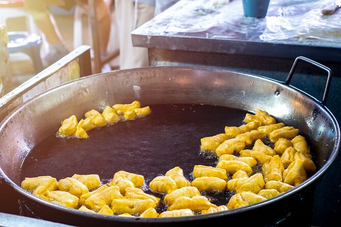 Chiang Mai Michelin Food Walking Tour with Professional Tour Guide - Stop Two, Gor Neng, and the Fun of Pa Tong Go