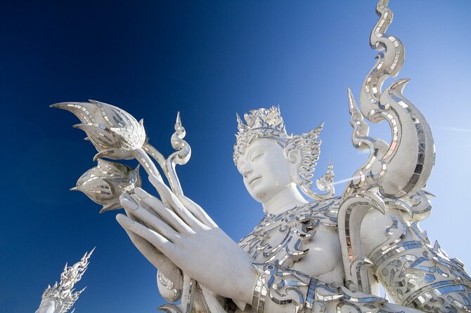 Chiang Mai to White & Blue Temple, Black Museum & Golden Triangle - Wat Rong Seur Ten Blue Temple: a longer visit with gold-and-blue contrasts