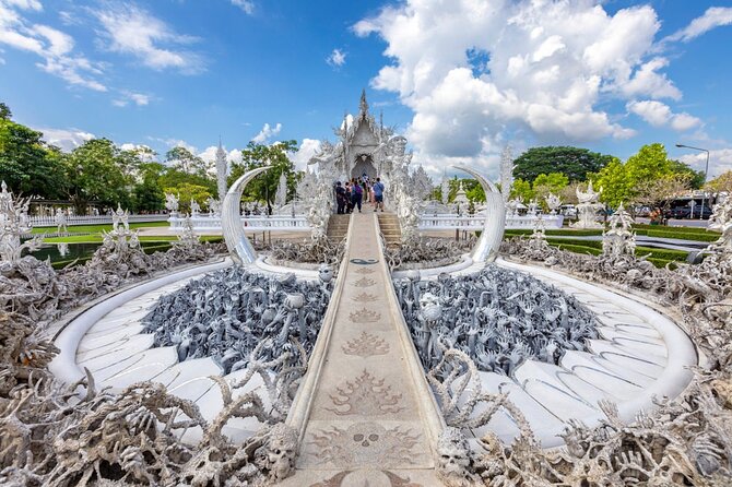 Chiang Mai to White & Blue Temple, Black Museum & Golden Triangle - Hill Tribe village visit: cultural time, and optional long-neck add-ons
