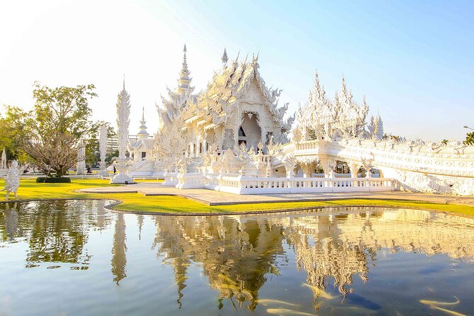 Chiang Rai Full Day Tour with Boat Trip and Longneck Village - Baan Dam Museum and Wat Rong Seur Ten: Black House Meets Blue Temple