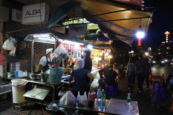 Chinatown Street Food Night Tour by Tuk Tuk in Bangkok - Wat Ratchanatdaram and the Grand Palace exterior photo moment