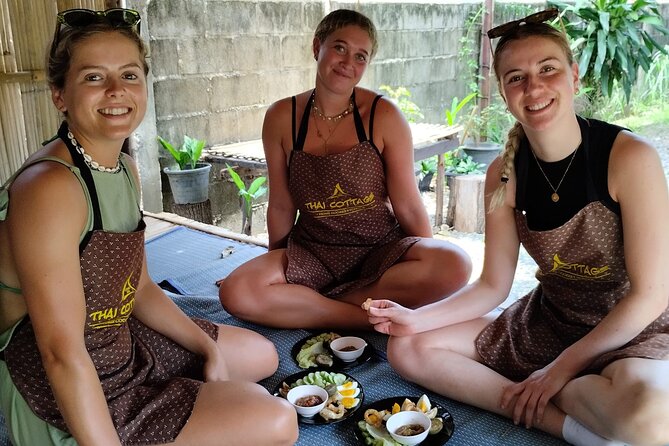 Cooking class in organic garden and local market tour ThaiCottage - Cooking with a traditional Thai family style: stations, pacing, and attention
