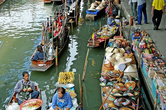 Damnoen Saduak Floating Market and Maeklong Railway Market Tour - Wat Bang Kung: the banyan-root chapel stop that often feels more meaningful than you expect