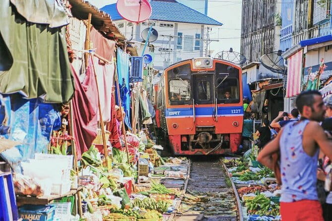 Damnoen Saduak Floating Market & Railway Market Tour from Bangkok - Price and what it actually covers, including the gotchas