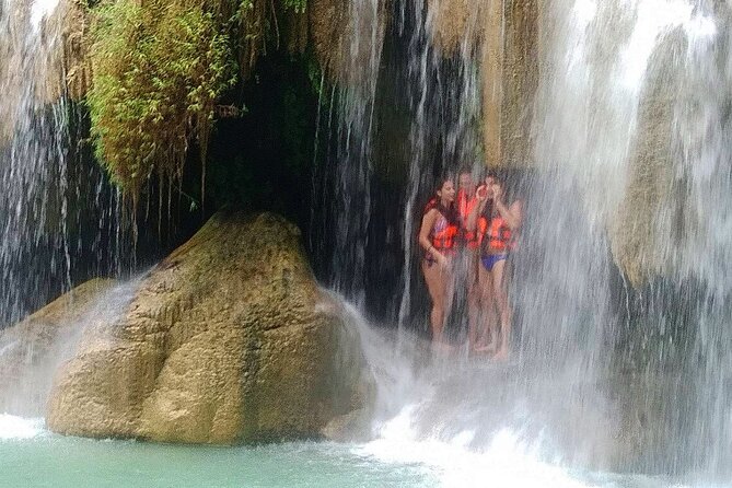 Erawan Waterfall and Kanchanaburi Private Tour [Optional Luxury] - The Long-Tailed Boat Ride: A Physical Pause and a Change in Scenery