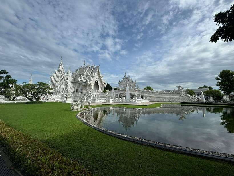 Explore the Chiang Rai and the Golden Triangle - Wat Rong Suea Ten (Blue Temple): color therapy, but in a quieter way