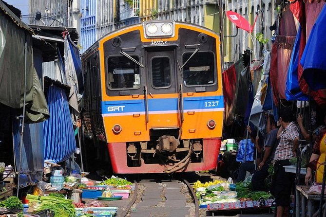 Floating Market Damnoen Saduak and Meklong Railway Market: Half Day Tour - Outside Bangkok in 5 to 6 Hours, With Two Icons