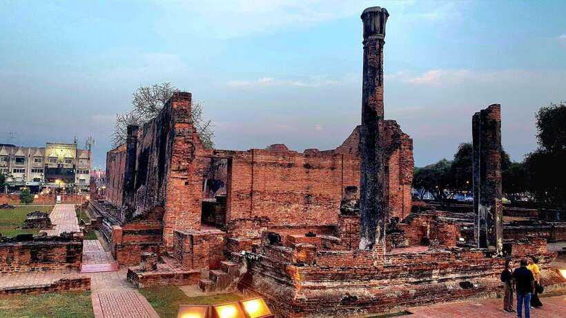 From Bangkok: Ayutthaya Afternoon Tour with Boat & Tuk-Tuk - Wat Mahathat: Buddha head in tree roots, plus why it matters