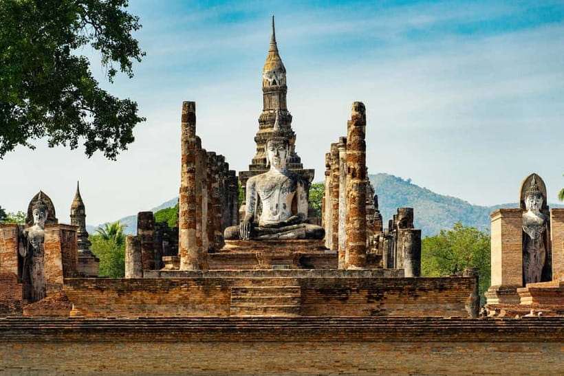 From Bangkok: Ayutthaya Heritage Tour with Sunset Boat Ride - Wat Maha That: the Buddha head tangled in tree roots