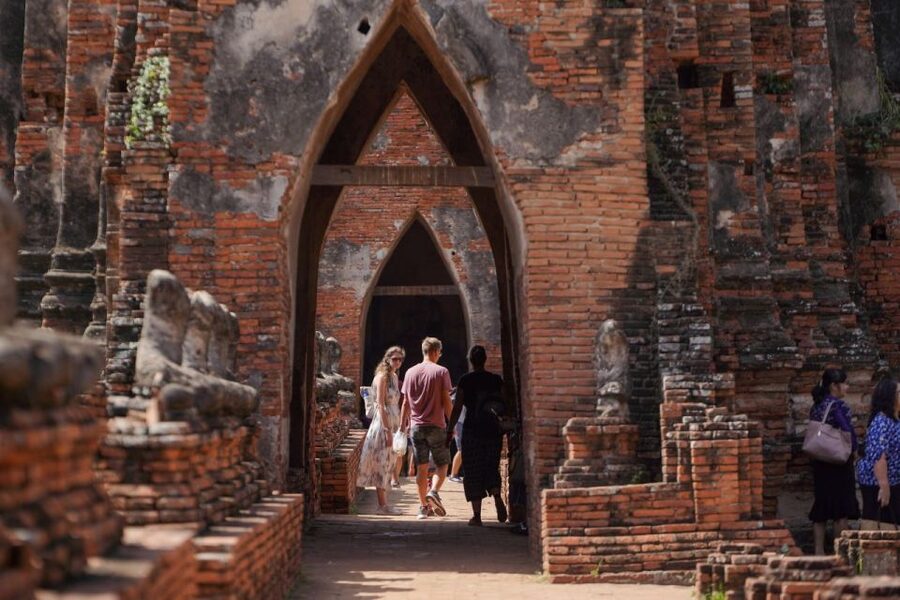 From Bangkok: Ayutthaya Historical Day Tour by Bus - Wat Lokayasutharam: the reclining Buddha that fills the frame