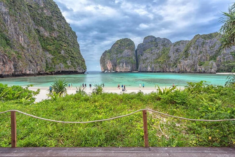 From Phi Phi: Sunset & Plankton Swim Tour By Speedboat - Loh Samah Bay and Maya Bay at sunset, the famous shoreline moment